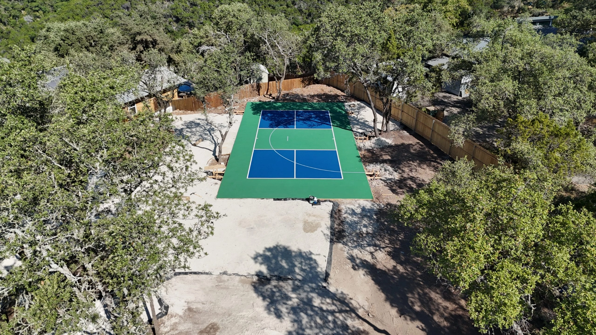 austin-backyard-pickleball-court-blue-green-finish-scaled