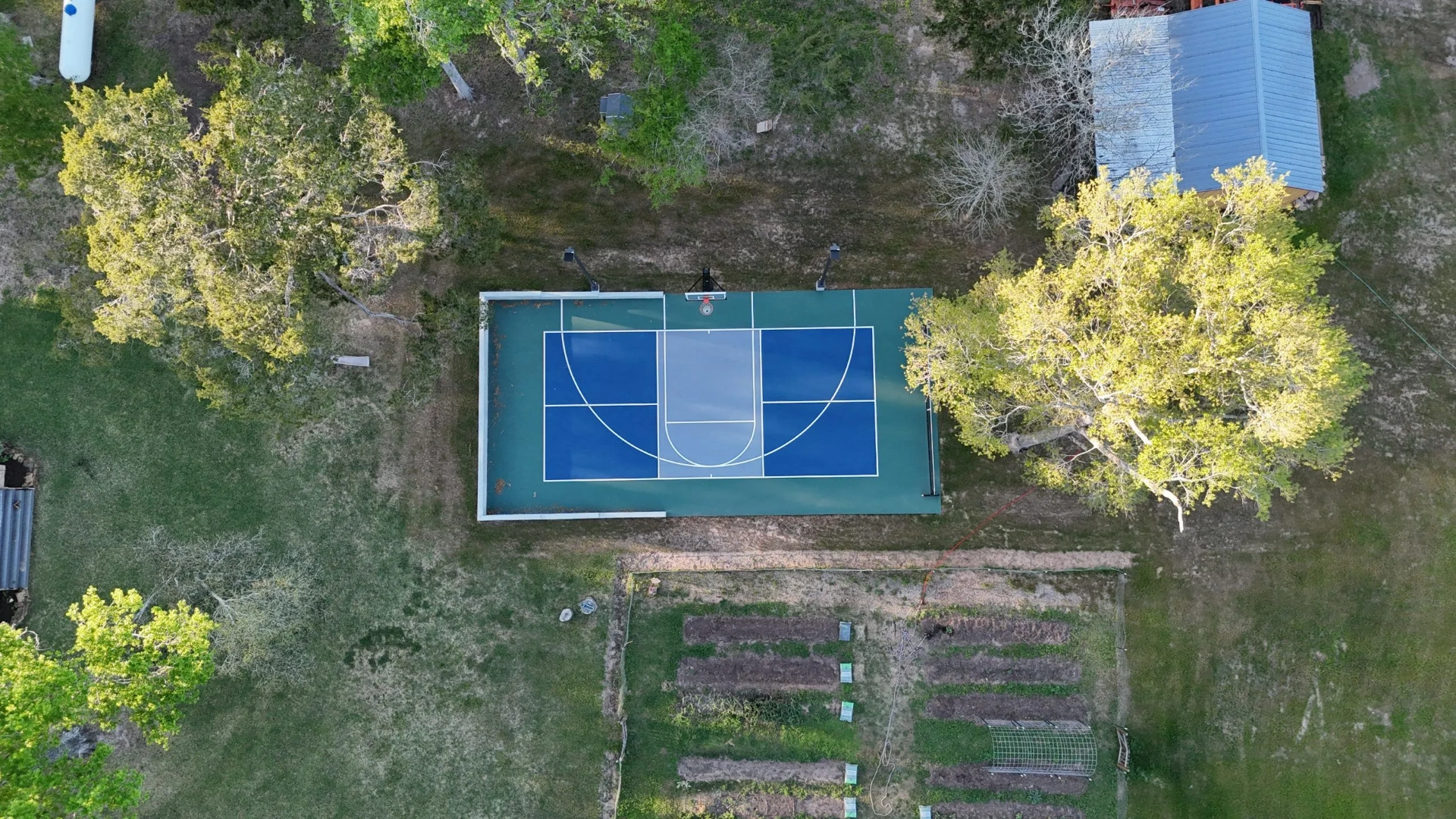 backyard-multi-sport-court-aerial-residential-scaled