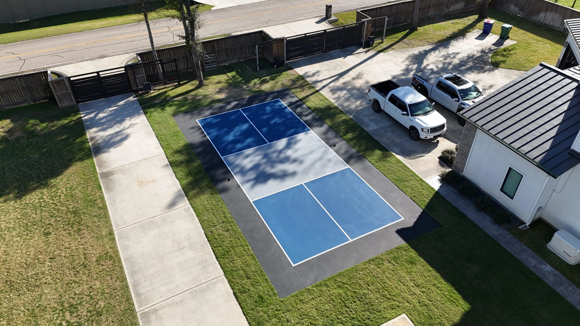 blue-pickleball-court-surfacing-spring-tx-aerial-residential