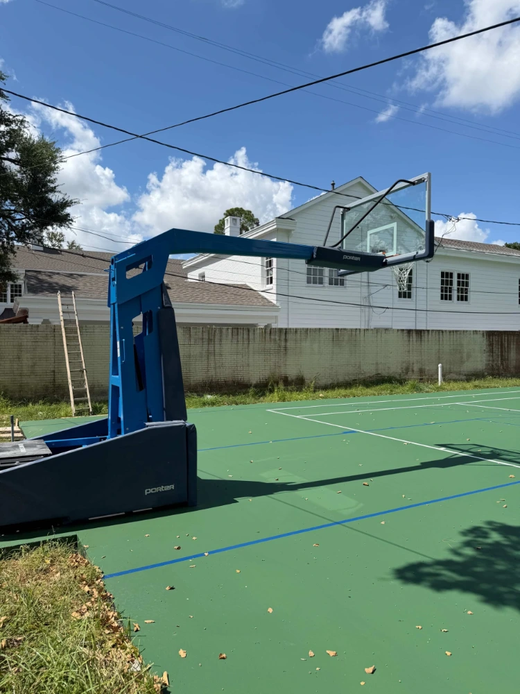 houston-backyard-tennis-court-with-basketball-lines-resurfacing-scaled