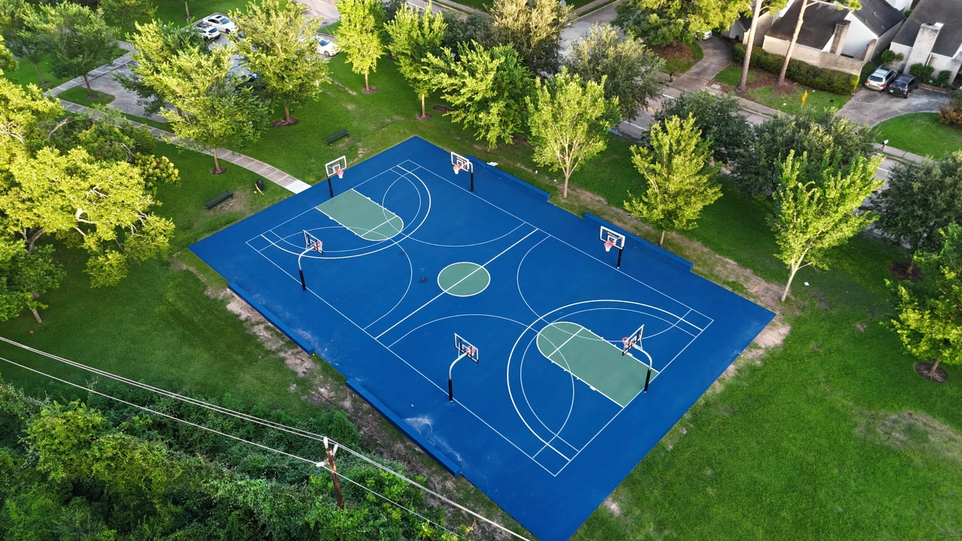 outdoor-basketball-court-houston-blue-green-sports-surface-scaled